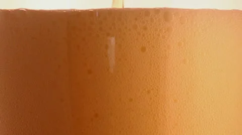 Pouring beer in a glass Stock Footage 10702460