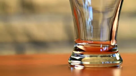 Pouring beer into a glass Stock Footage 11576033