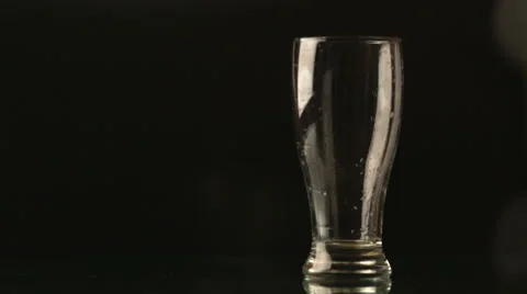 Pouring beer into a glass Stock Footage 47499337
