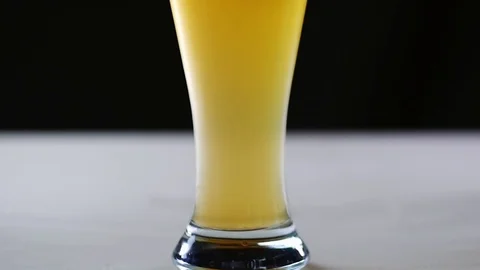 Pouring beer into the glass. Stock Footage 79372753