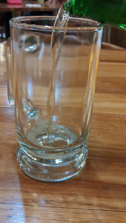 Pouring Beer into Glass Video stock 335205734