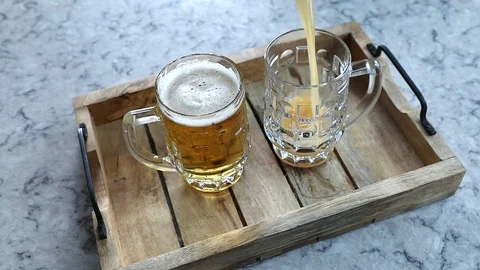 Pouring  beer into mug Stock Footage 93733518