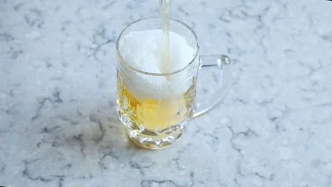 Pouring  beer into mug Stock Footage 93733525
