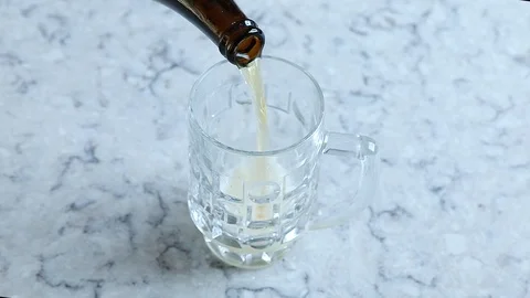 Pouring  beer into mug Stock Footage 93733533
