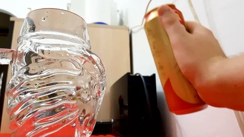 Pouring beer in a mug at the kitchen Stock Footage 93278078