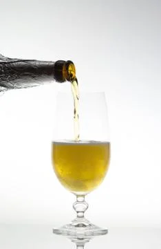 Pouring the beer Stock Photos