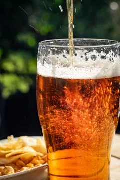 Pouring a beer Stock Photos