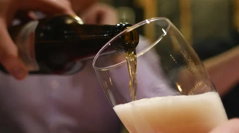 Pouring beer in pub Stock Footage 58259694