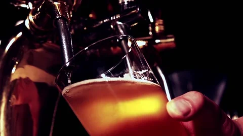 Pouring the beer in slow motion Stock Footage 67858520