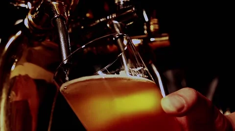 Pouring the beer in slow motion Stock Footage 67862497
