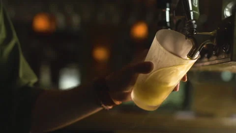 Pouring a beer in slow motion Stock Footage 130338509