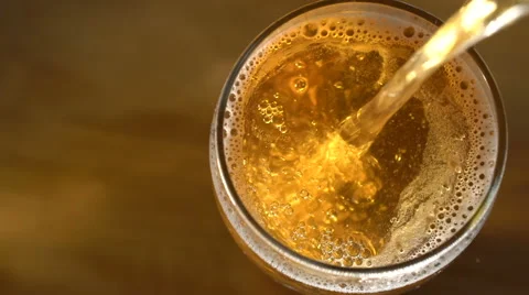 Pouring beer top view Stock Footage 62478982