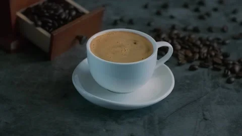 Pouring black coffee in cup. Espresso coffee Stock Footage