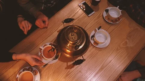 Pouring boiling brewed tea from Russian kettle Samovar Video stock 109547271