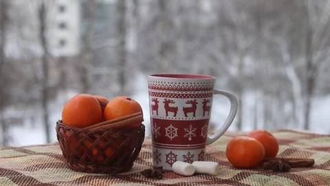 Pouring boiling water into the cup from the kettle in the winter. 스톡 동영상 108190938