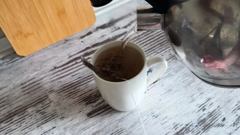Pouring Boiling Water into Tea Mug 動画素材 340340928