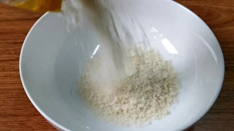 Pouring breadcrumbs Stock Footage 148402246