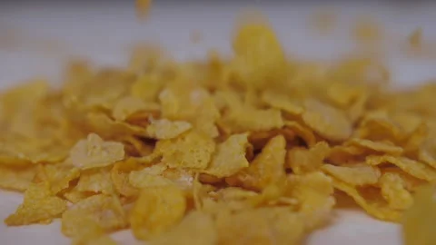 Pouring breakfast corn flakes cereals  Stock Footage 148335418
