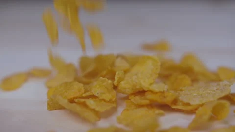Pouring breakfast corn flakes cereals slow motion Stock Footage 148341020