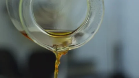 Pouring brewed coffee from coffee pot Stock Footage 108909535
