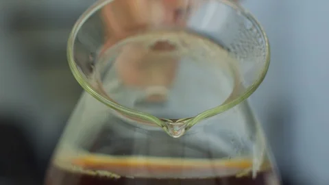 Pouring brewed coffee from coffee pot Stock Footage 108910917