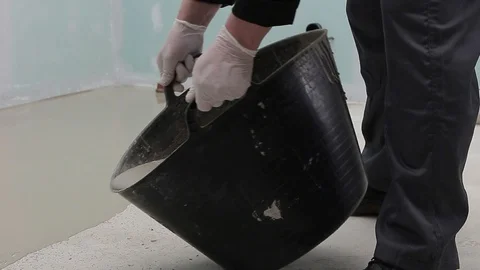 Pouring a bucket with material Stock Footage 111939151