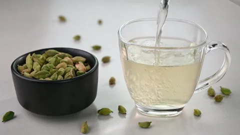Pouring cardamon water 動画素材 245543402
