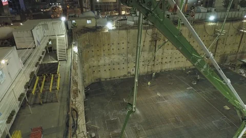 Pouring cement at construction site at night. Stock Footage 123652204