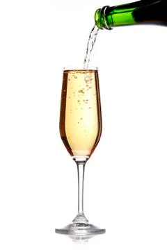 Pouring champagne in a flute Stock Photos