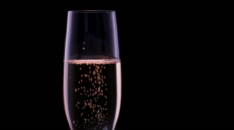 Pouring champagne in a glass - with bubbles Stock Footage 52923959