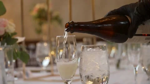 Pouring Champagne at Wedding Reception Stock Footage 158331563