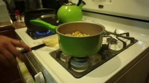 Pouring Cheese into Mac n Cheese Video stock 11858946