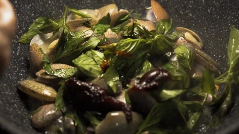 Pouring chilli paste in a pan. Stir Fried Clams with Roasted Chili Paste Stock Footage 126287832