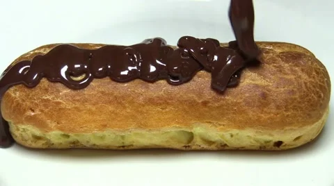 Pouring the Chocolate on the cake Stock Footage 57539625