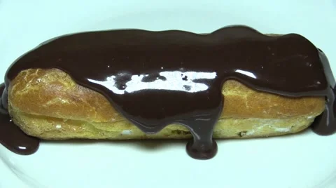 Pouring the Chocolate on the cake Stock Footage 57782372