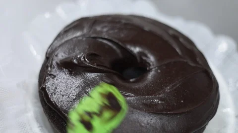 Pouring Chocolate Dressing in Chocolate Cake Stock Footage 129046043