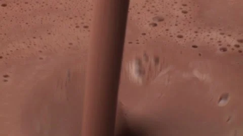 Pouring chocolate milk Stock Footage 8573291