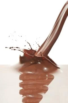 Pouring chocolate Stock Photos