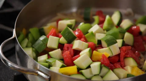 Pouring Chopped Vegetables In Pan Stock Footage 27297265