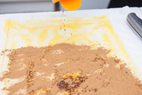 Pouring cinnamon Stock Photos