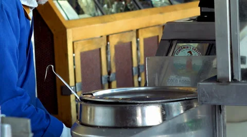 Pouring of the clam chowder to the bread bowl at the  Fisherman's Wharf. Stock Footage 39001359