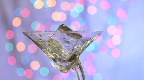Pouring   clear cocktail Stock Footage 8600527