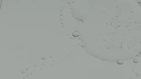Pouring Clear Gel Background Stock Footage 77778522