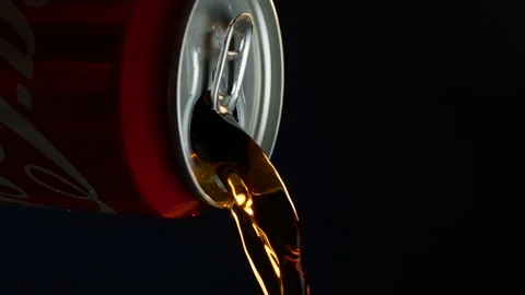 Pouring Coca Cola from a can macro closeup Video stock 162500186
