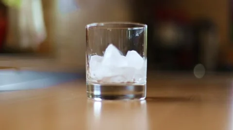 Pouring cocktail on ice Stock Footage 63377585
