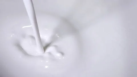 Pouring coconut milk Stock Footage 237518844