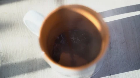 Pouring coffe into a cup Stock Footage 123769815