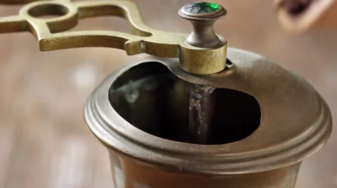 Pouring coffee beans to manual coffee grinder Stock Footage 59230193