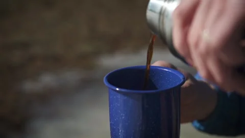 Pouring Coffee into Blue Mug Stock Footage 243121296