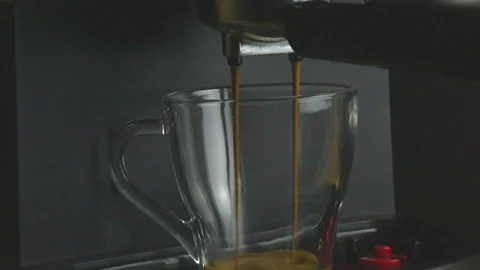 Pouring coffee from the coffee machine Stock Footage 70772562
